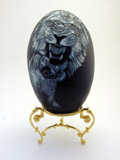 Lions carved emu egg